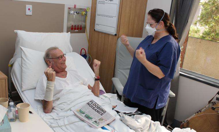 Allied Health Assistant Joanne Howard works with patient Klaus Koenig during his recovery at Wonthaggi Hospital.