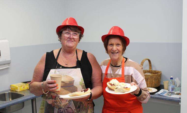 BCH Ladies Auxiliary members Raye Tucker and Maureen Chisholm were among the volunteers serving tasty Devonshire teas.