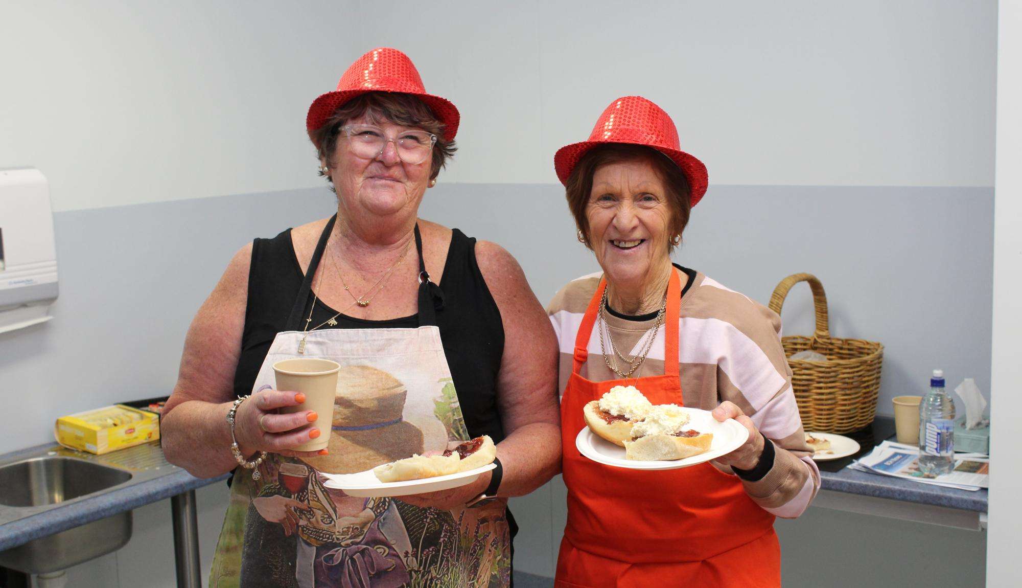 BCH Ladies Auxiliary members Raye Tucker and Maureen Chisholm were among the volunteers serving tasty Devonshire teas.