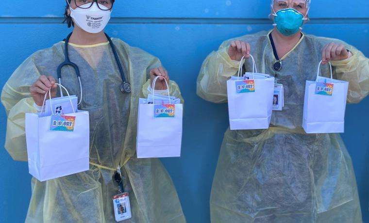 Bass Coast Health Emergency Department staff Amy Bradford (left) and Catherine Bunn with R U OK gift bags full of activities to prompt discussion about wellbeing.