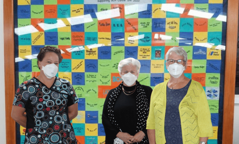Bass Coast Health CEO Jan Child (centre) with Marlene Talbot, Treasurer of the Bass Coast Health Ladies Auxiliary (right) and Anna Kenny, Nurse Unit Manager of the L. Rigby Centre, with the Signature Quilt.