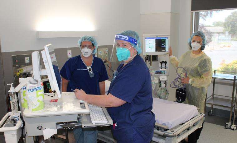 Theatre nurses Cait Castellan, left, and Kim Chetland, centre, assist in the Emergency Department at Wonthaggi Hospital, with Emergency Department Nurse Unit Manager Samantha Nicklen.