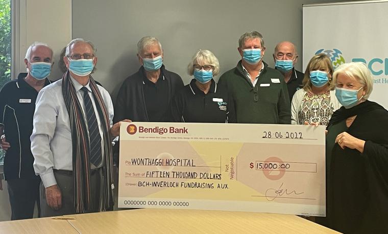 Inverloch Fundraising Auxiliary members present a cheque towards an ultrasound for cancer patients to Bass Coast Health CEO Jan Child (at right). Back, from left, Auxiliary President Gerry Surridge, Kathy Surridge (hidden), Ron Missen, Hazel Missen, Bill Damm and Klaus Edel, with BCH Volunteers and Fundraising Manager Mandy Gilcrist. Front, Auxiliary Secretary Terry Hall. Caption