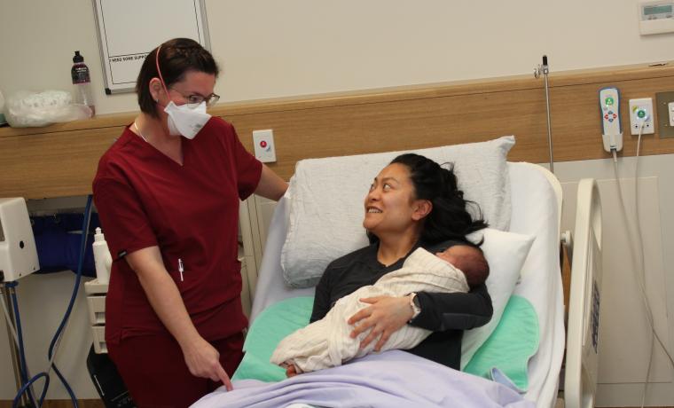 Bass Coast Health Midwife Peta Martin, with new mother Emily Stull and her baby boy, Benjamin.