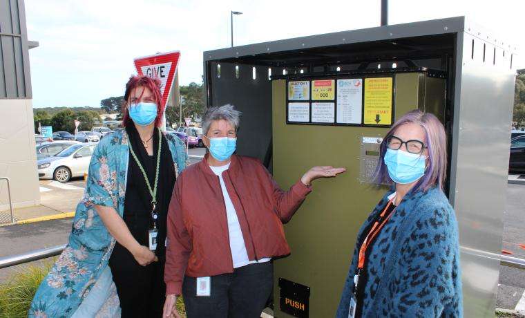 Members of the Alcohol and other Drugs Counselling Team at Bass Coast Health, from left, Counsellor Jasmin Friend, Pharmacotherapy/Withdrawal Nurse Sarah Bone and Counsellor Sharyn Latham with the dispensing machine at Wonthaggi Hospital.