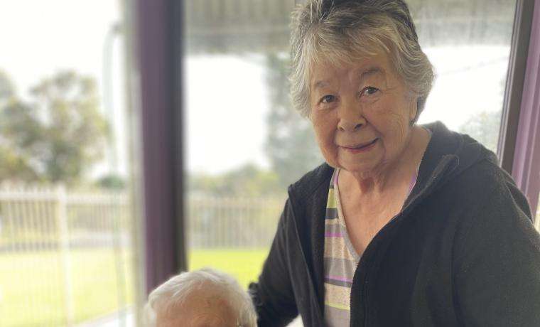 Griffiths Point Lodge residents Ruth Andrews (seated) and Betty Pescud have raised funds for children in war-torn Ukraine.