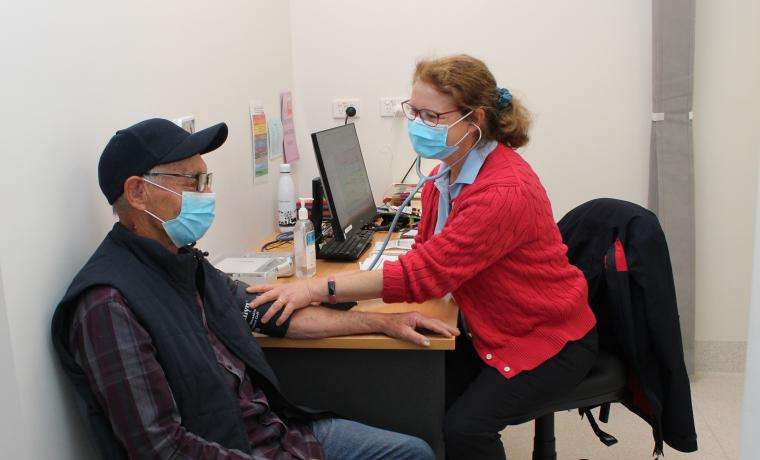 Chris Henry receives advice from Claire Gatto, a Credentialled Diabetes Educator at Bass Coast Health.