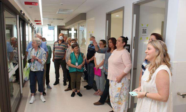 Emergency Department Acting Nurse Manager Cat Bunn (right) describes the features of the new Emergency Department.