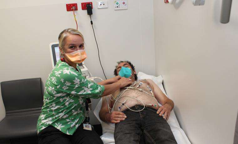 Angela Tiziani, the new Rapid Access Atrial Fibrillation (AF) Clinical Nurse Consultant at Bass Coast Health, monitors patient Andrew Johns.