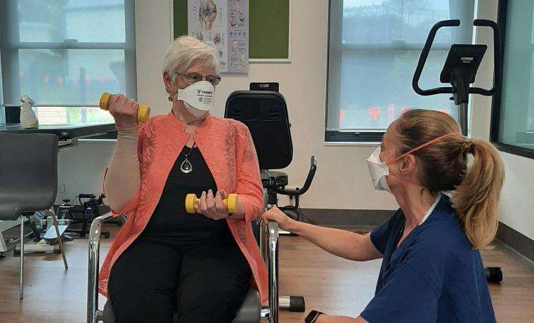 Bass Coast Health Physiotherapist and Lymphoedema Practitioner, Michelle McMahon, works with patient Pamela Nicka.