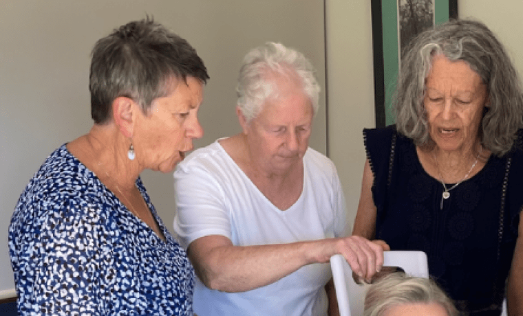 The volunteers of the San Remo Opportunity Shop funded a lifting chair for Griffiths Point Lodge aged care at San Remo, operated by Bass Coast Health. Op shop volunteers Sandra Thorley, Joan Ray and president Sara Fleisner demonstrate the chair with staff member Natasha Stapleton.