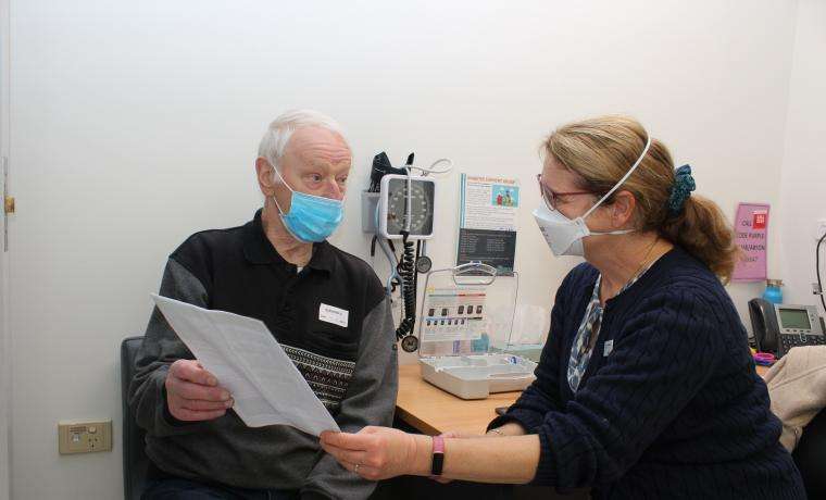 Credentialled Diabetes Educator Claire Gatto consults with patient Kenneth Dipper at Bass Coast Health. [