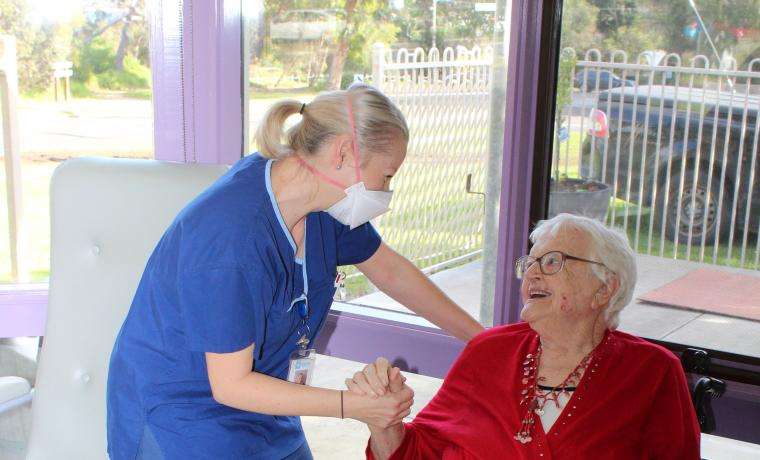 Griffiths Point Lodge Lifestyle Assistant Natasha Stapleton shares a special moment with resident Ruth  Andrews