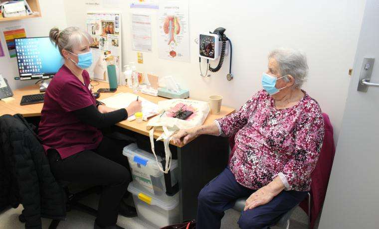 Bass Coast Health Continence Nurse Practitioner Dianne Jones consults patient Beverly Bowker.
