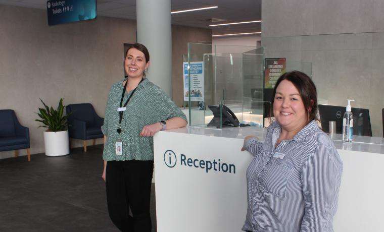 Amy Brusamarello, right, Reception and Administrative Support Assistant at Bass Coast Health, is relishing her career change. She’s pictured with Wonthaggi Hospital Receptionist Allison Ewbank.