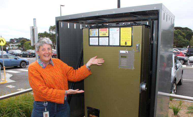 Withdrawal Nurse Sarah Bone with the dispensing machine at Wonthaggi Hospital that provides free needles, sharps and swabs for people in our community to reduce the risk of infection and subsequent hospitalisation.