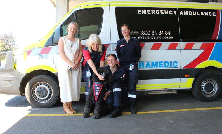 Ambulance Victoria Peer Support Handler Jenny Lonsdale (second from left) and her dog Anna were at Wonthaggi Hospital to meet, from left, Bass Coast Health Acting Operations Director Cat Bunn and Ambulance Victoria Paramedics from Leongatha, Jasmine and Emma.