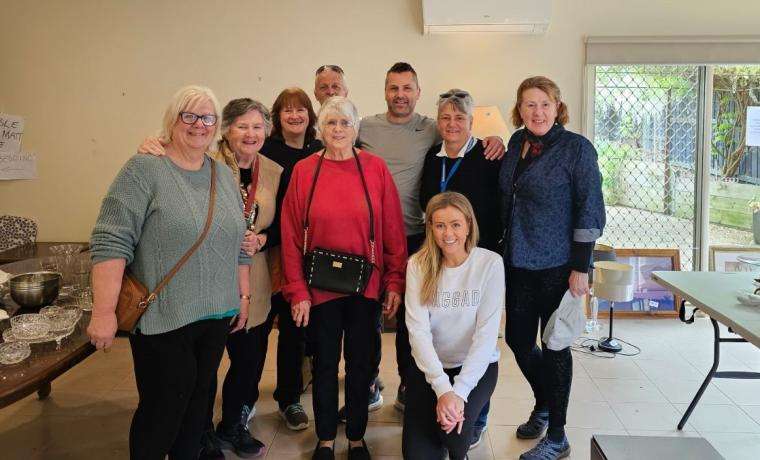 Supporting the Gala Garage Sale courtesy of the late Yvonne Morgan were, from left, Phillip Island Health Auxiliary members Debbie O’Donnell and Louanne Caldwell, helper Marion, Health Hub friend Ruth Hopkins, shopper Garry, Yvonne’s son Trent Morgan, Sue Gale, Trent’s partner Sarah Wilson and Auxiliary President Lyn Wadeson.