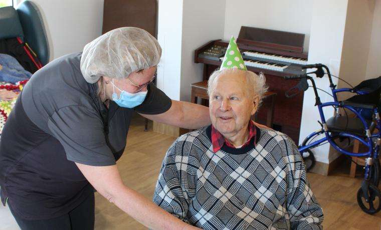 The team at Kirrak House celebrate residents’ birthdays and other occasions. Enjoying festivities were  resident Ed Harmer and Kitchen Staff member Rhonda Hall.