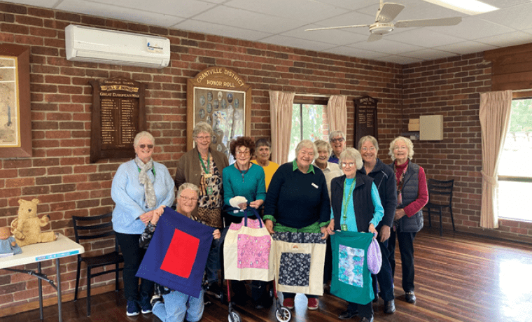 Members of the Grantville CWA with bags they created for Bass Coast Health, from left, Julie Sanders, Gail Huitema, Jacki Dow, Lyn Whitlam, Carol MacPherson, Annie Graham, Margaret Boyer, Faye Tuchtan, Gwen Swan, Kaye Illingworth and Margaret Prior.
