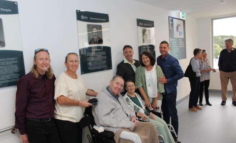 John Owens (third from left) with his honour board and family, from left, Leigh Owens, Carolyn  Copeland, Margaret Owens, John Owens, Joanne Hakanson and Richard Stone.