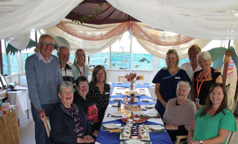 The family of the late Vivian Reith gather with Bass Coast Health team members for a morning tea to  acknowledge Mrs Reith’s donation to new flooring at Griffiths Point Lodge, pictured.  From left, Jim Norton, Fran Reith, Albert Sage, Miranda Sage, BCH Volunteer and Fundraising  Manager Vicki Riley, BCH Operations Director Rebecca Grant, BCH Diversional Therapist Natasha  Stapleton, BCH CEO Jan Child, BCH Diversional Therapist Donna Dalton, Volunteer Jan Klain and  Griffiths Point Lodge Acting Nurse Unit Ma
