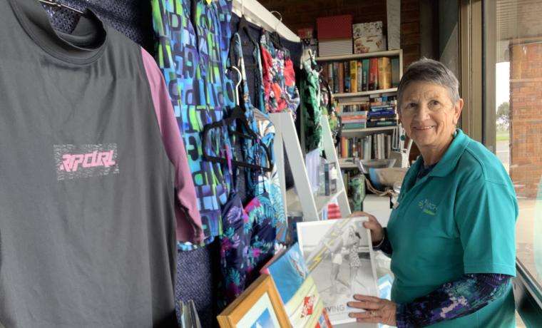 San Remo Opportunity Shop Auxiliary Committee Member, Sandra Thorley, invites locals and holiday-makers to check out the range of beach items for sale.