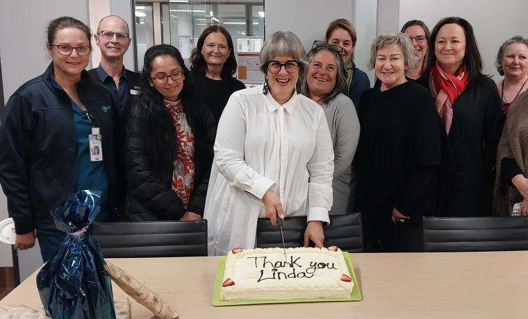 Linda Goltz cuts the cake recognising her 38 years of service and farewell from full-time work with Bass Coast Health. She celebrated the occasion with colleagues.