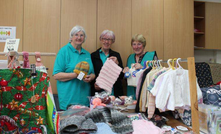Bass Coast Health Ladies Auxiliary members Cynthia Walker, Lyn Steer and Mary O’Connor sold creative hand-knitted items at the fete.
