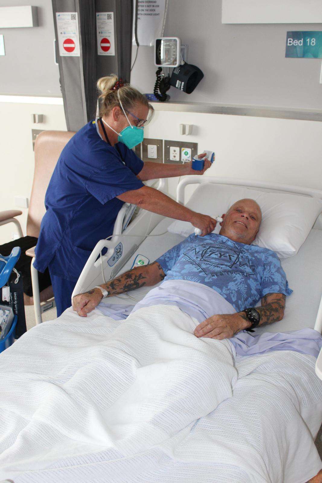  Nurse Bernie Carew with patient Michael Sawers, Wonthaggi 2022 01 17