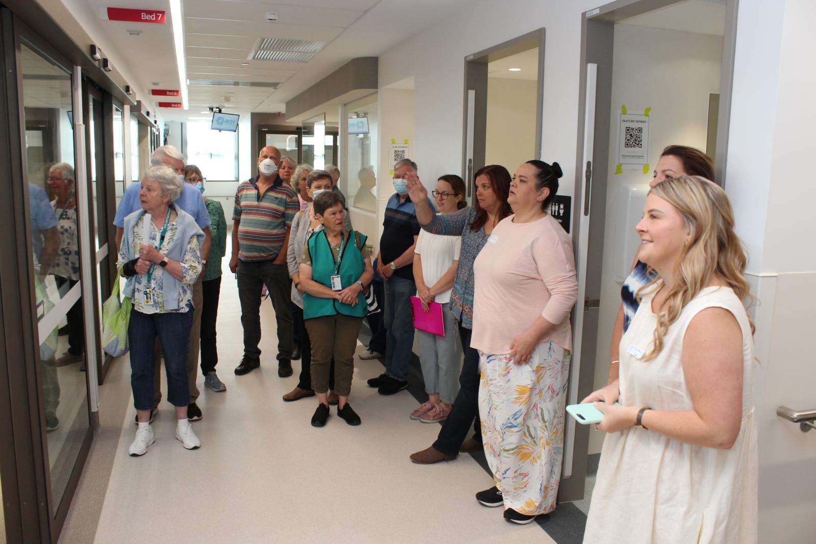 Emergency Department Acting Nurse Manager Cat Bunn (right) describes the features of the new Emergency Department.