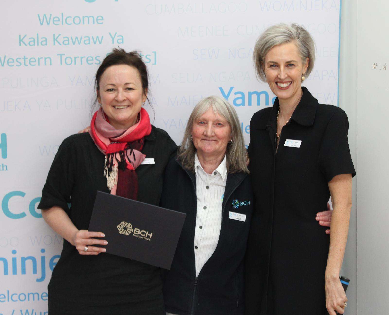 Sheryl Mark, centre, of Health Information Services has served Bass Coast Health and its predecessors for 45 years. She’s with Chief Operating Officer/Director of Nursing Christine Henderson, left, and Interim CEO Simone Alexander.