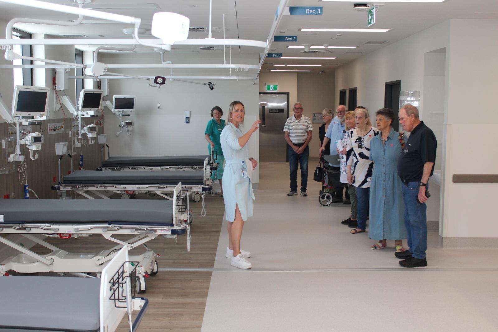 BCH Operations Director Katie Chandler leads a tour group through the recovery area, part of the surgical suite at the Phillip Island Community Hospital.